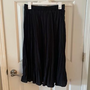 Black pleated silky skirt